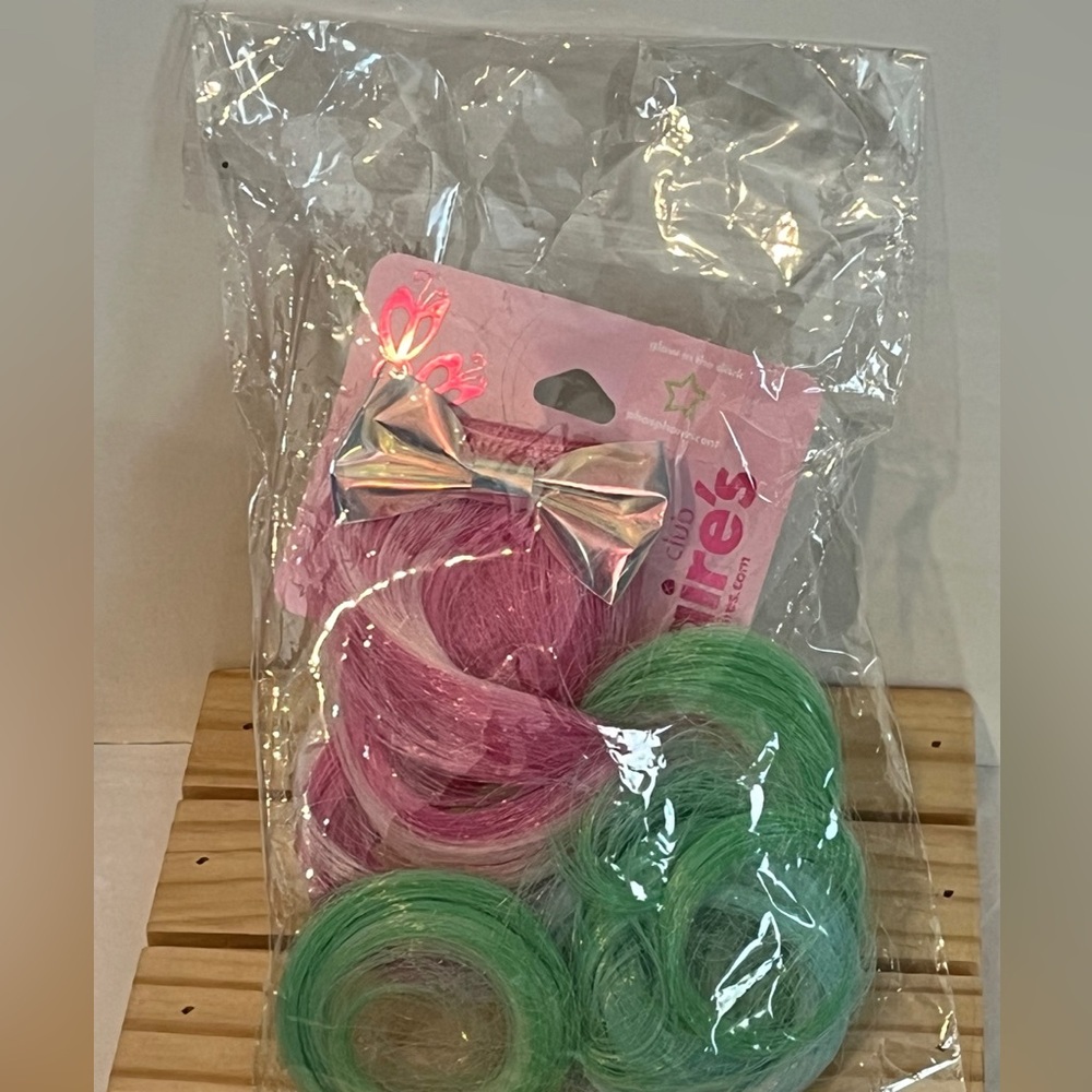 PICK 3/$15.00. Claire's Vibrant Pink and Green Hair Extensions with Silver Bow